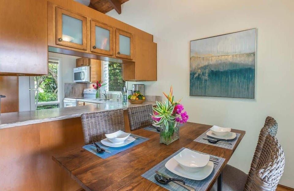 Dining room with seating for 4 Fruit and items shown are for staging purposes only.