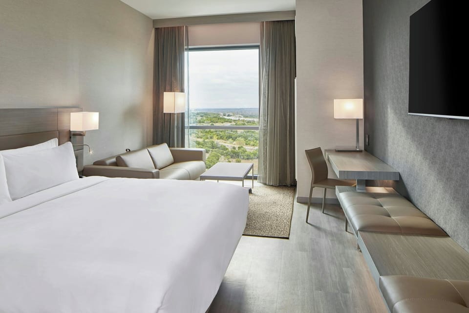 Premium bedding, down comforters, in-room safe, desk