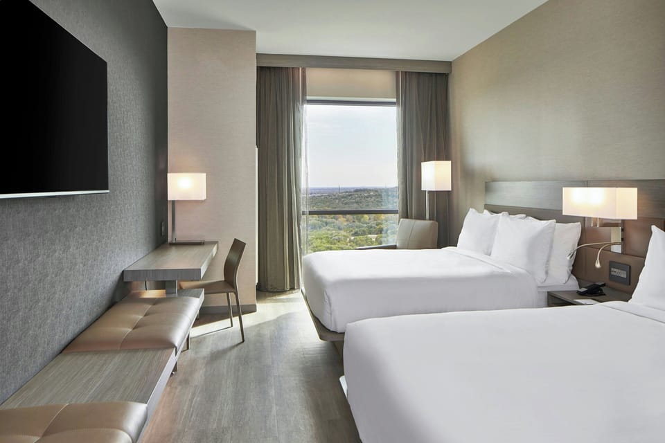 Premium bedding, down comforters, in-room safe, desk