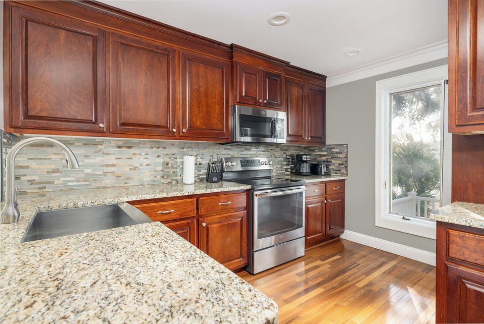 Relaxing Kitchen with ample counter space and stainless steel appliances