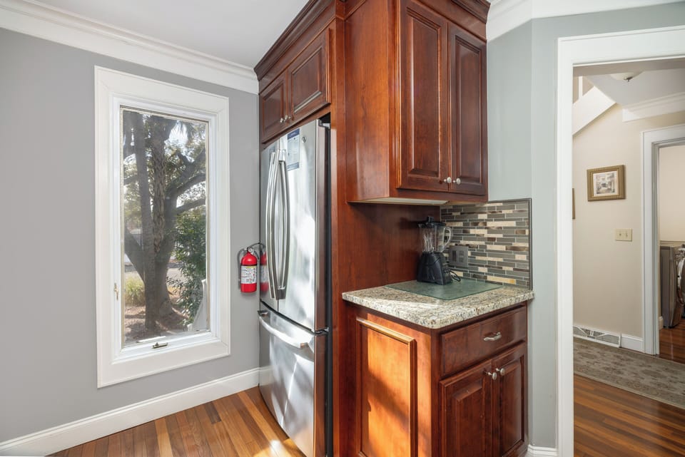 Inviting Kitchen highlighting ample counter space, stainless steel appliances