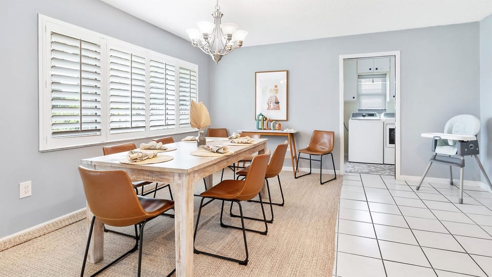 Comfortable dining area designed for families, featuring a high chair so everyone has a seat at the table.