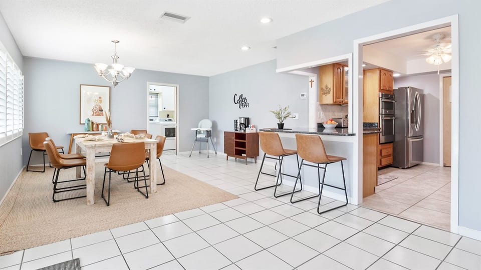 Share meals, stories, and laughter in this welcoming dining space just steps from the kitchen.