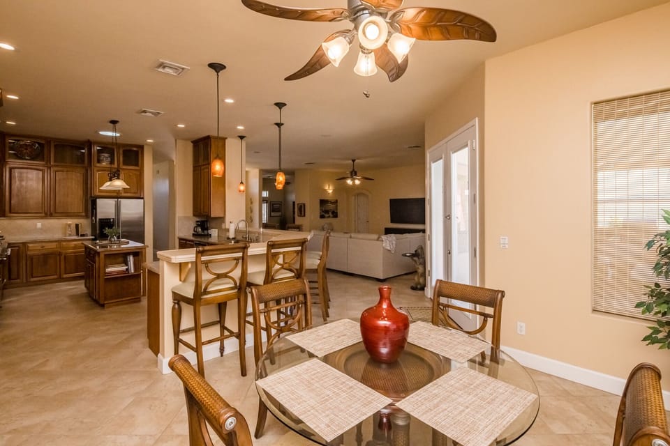 Breakfast nook with view of pool.