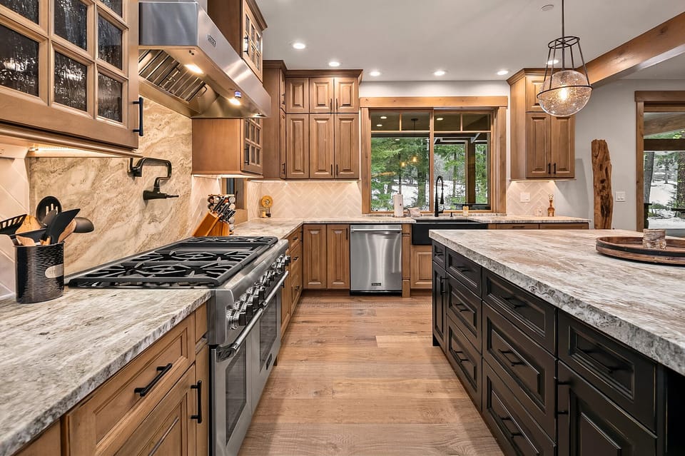 Dreamers Lodge: - Viking appliances throughout the kitchen featuring a 6 burner gas stove.