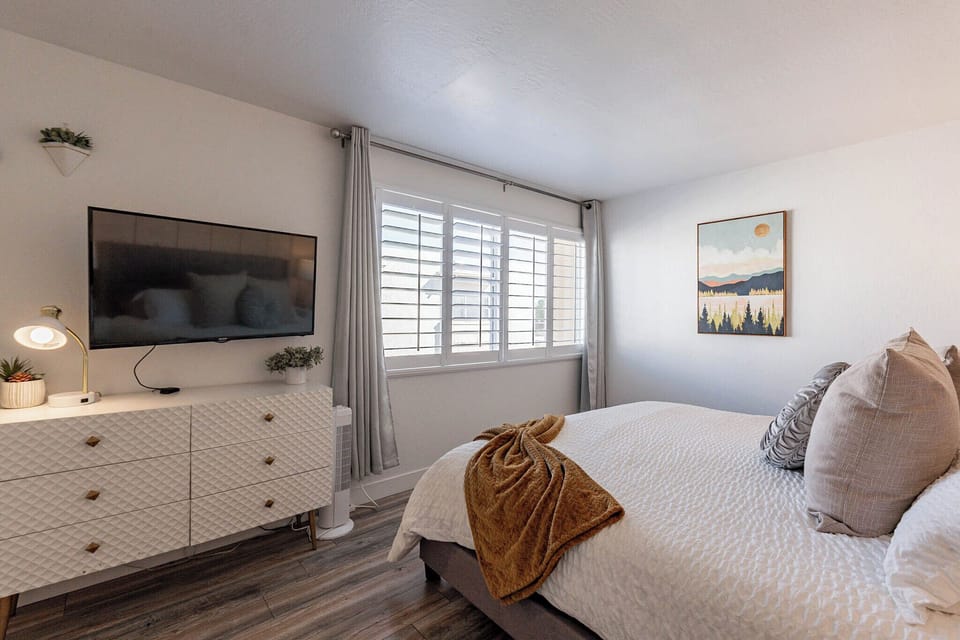 Bedroom #2 with wall-mounted TV