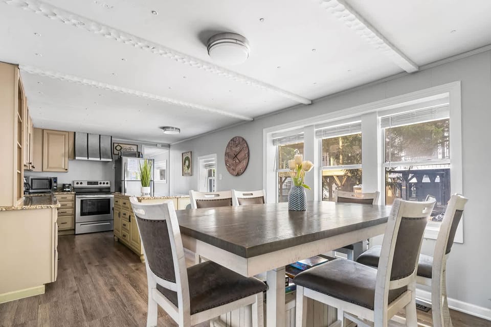 Bright, open kitchen and dining area with garden views