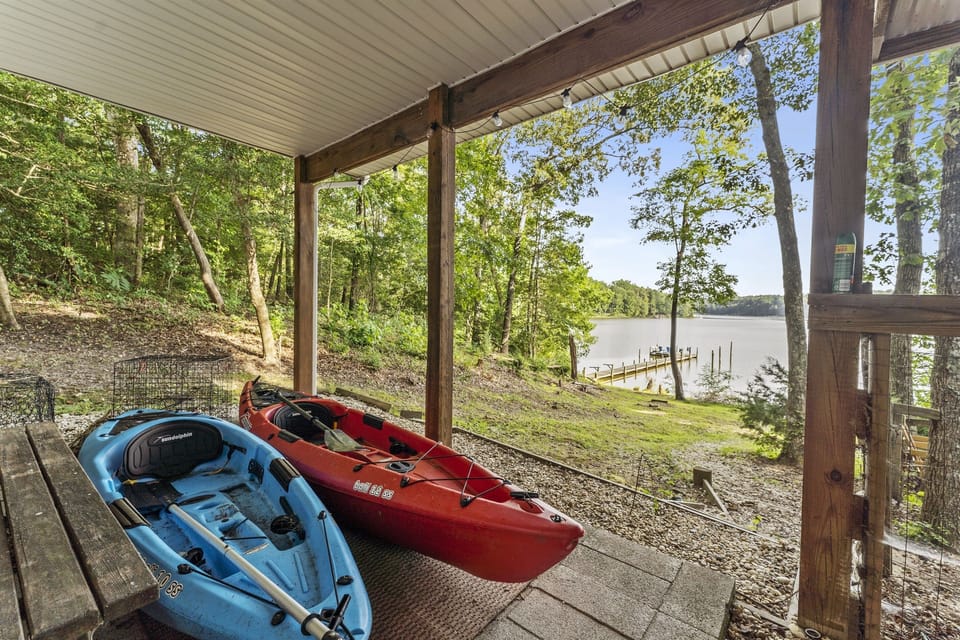 Kayaks on patio downstairs.
