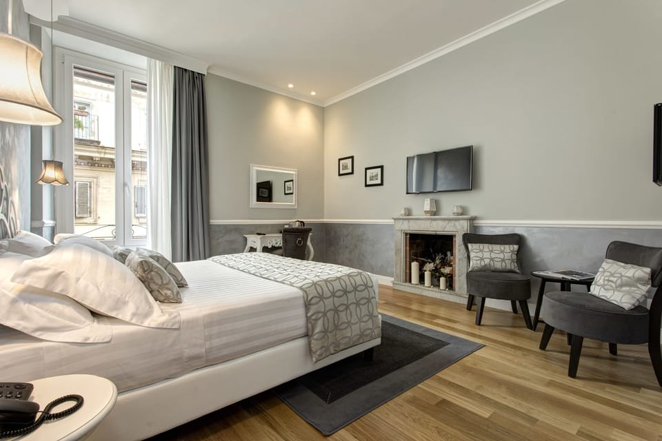 Deluxe Room | Minibar, in-room safe, soundproofing, free WiFi