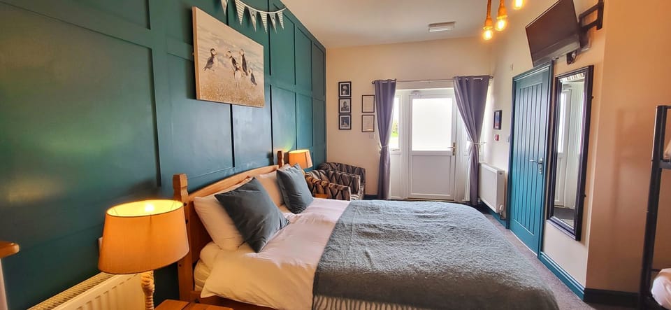 Family Room (Ynys Seiriol) | Individually decorated, individually furnished, laptop workspace