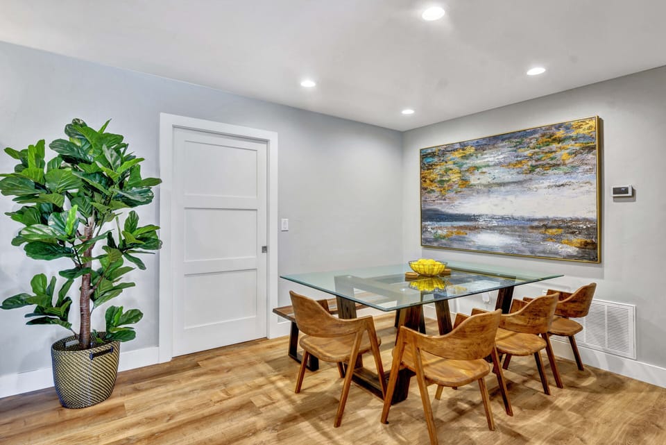Dining room with door to game room.