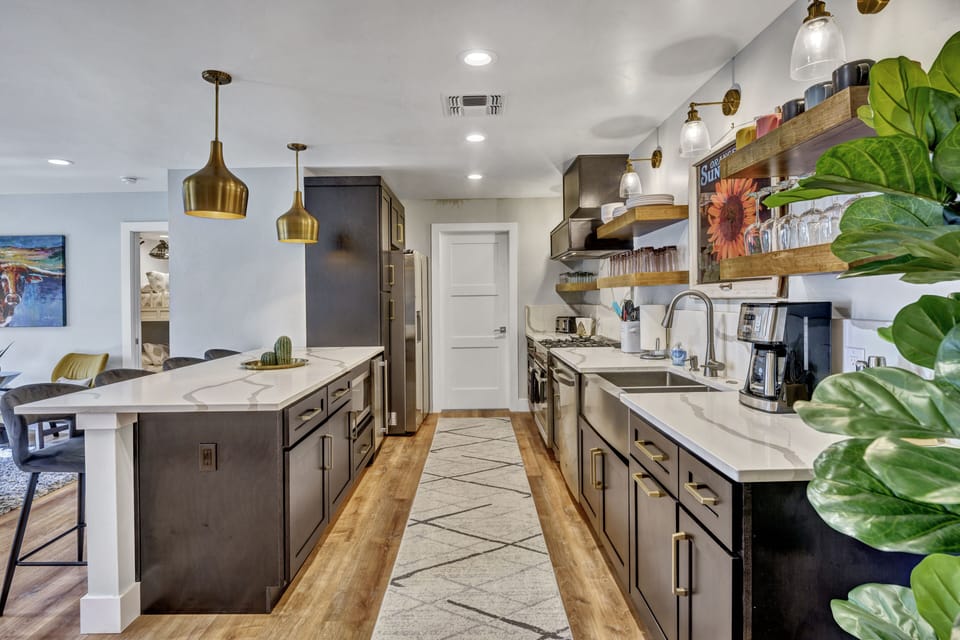Kitchen with full bath at the end.