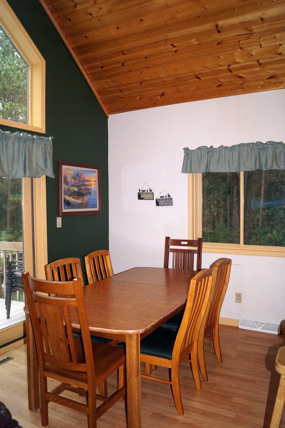 Dining table is right in-between the kitchen & living room.