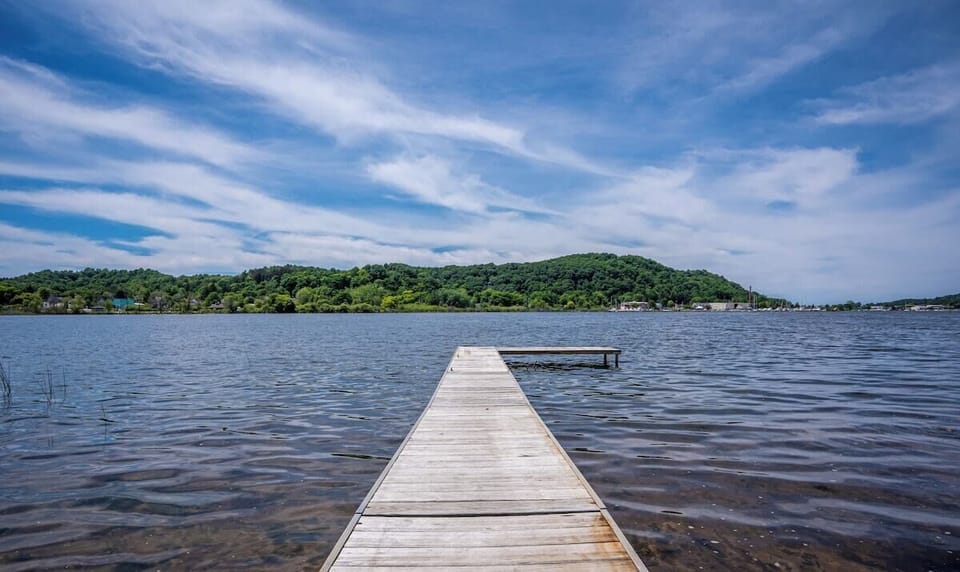 EXTERIOR:  The large private dock that extends out into Betsie Lake.