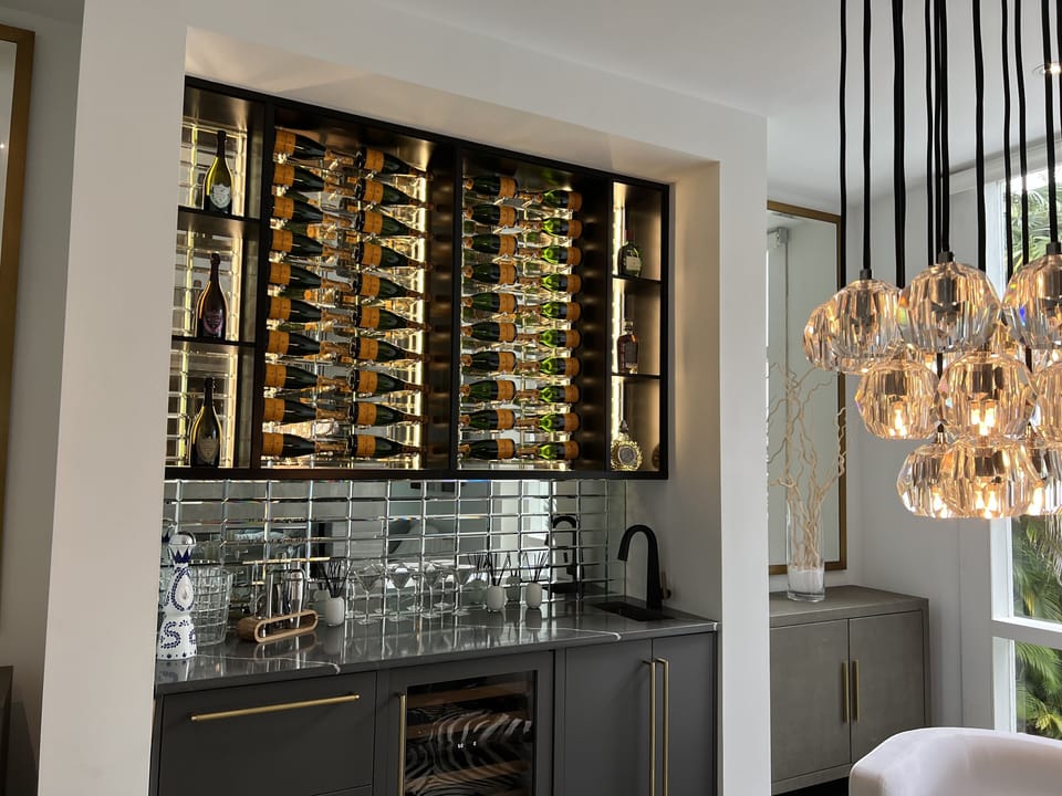 Stunning 50 bottle custom LED Wine & Spirits display and Sub Zero Wine Chiller