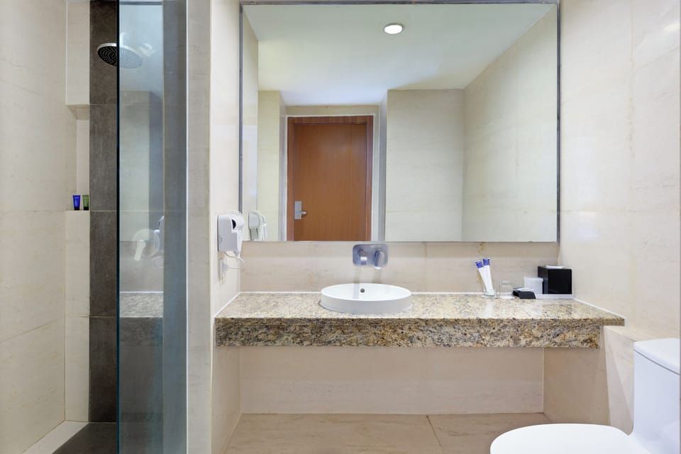 Shower, free toiletries, hair dryer, towels