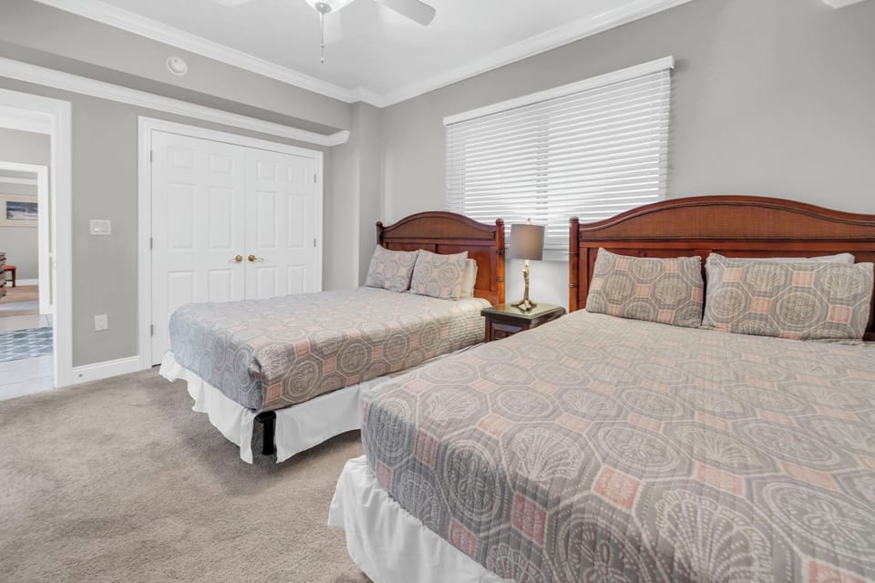 Guest bedroom 1 with two queen beds