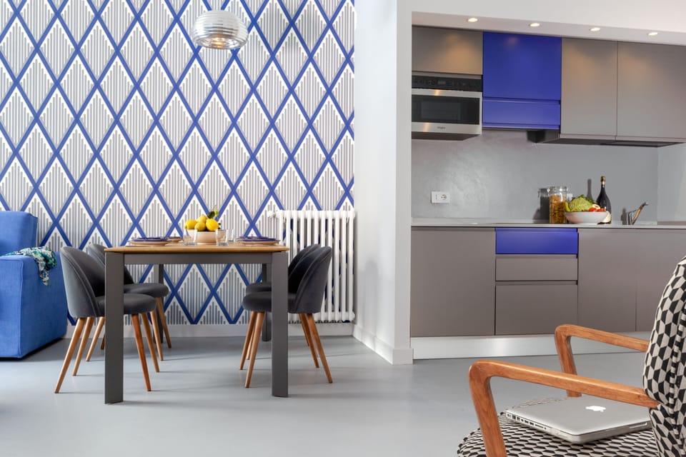 Design Apartment | Shared kitchen | Microwave, spices, cleaning supplies, dining tables