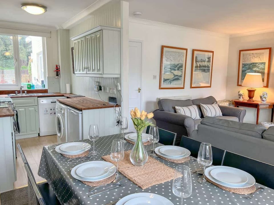 Kitchen and dining area with garden access, perfect for indoor-outdoor family meals