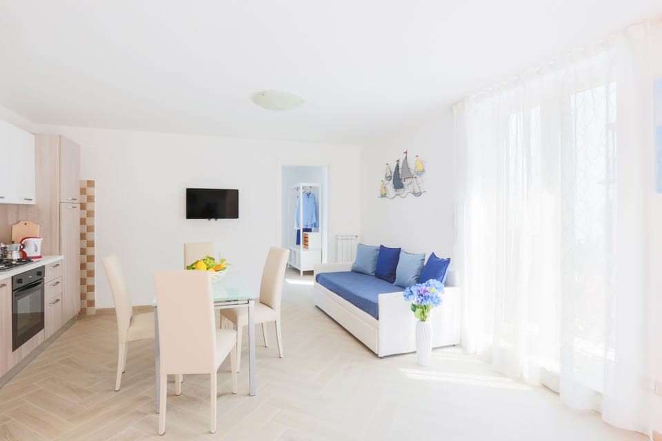 Family Apartment | Living area | Flat-screen TV