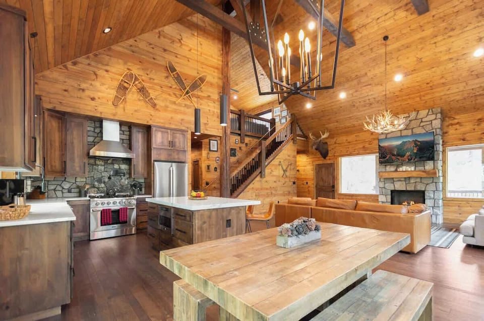 Gourmet kitchen with oversized island and open-concept dining
