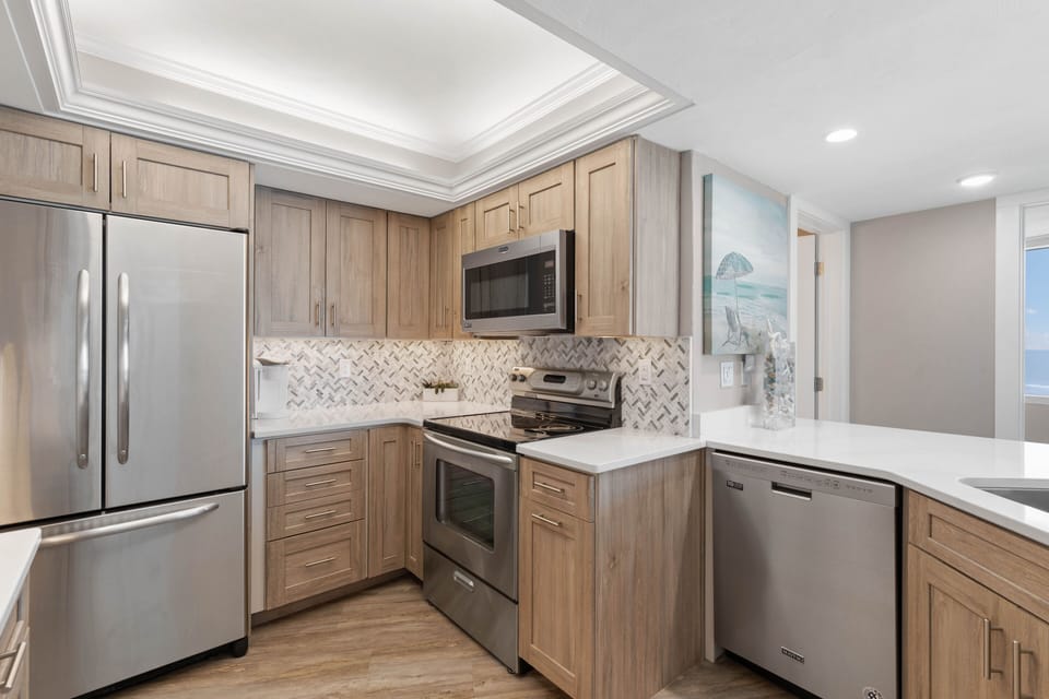 Kitchen opens into living area