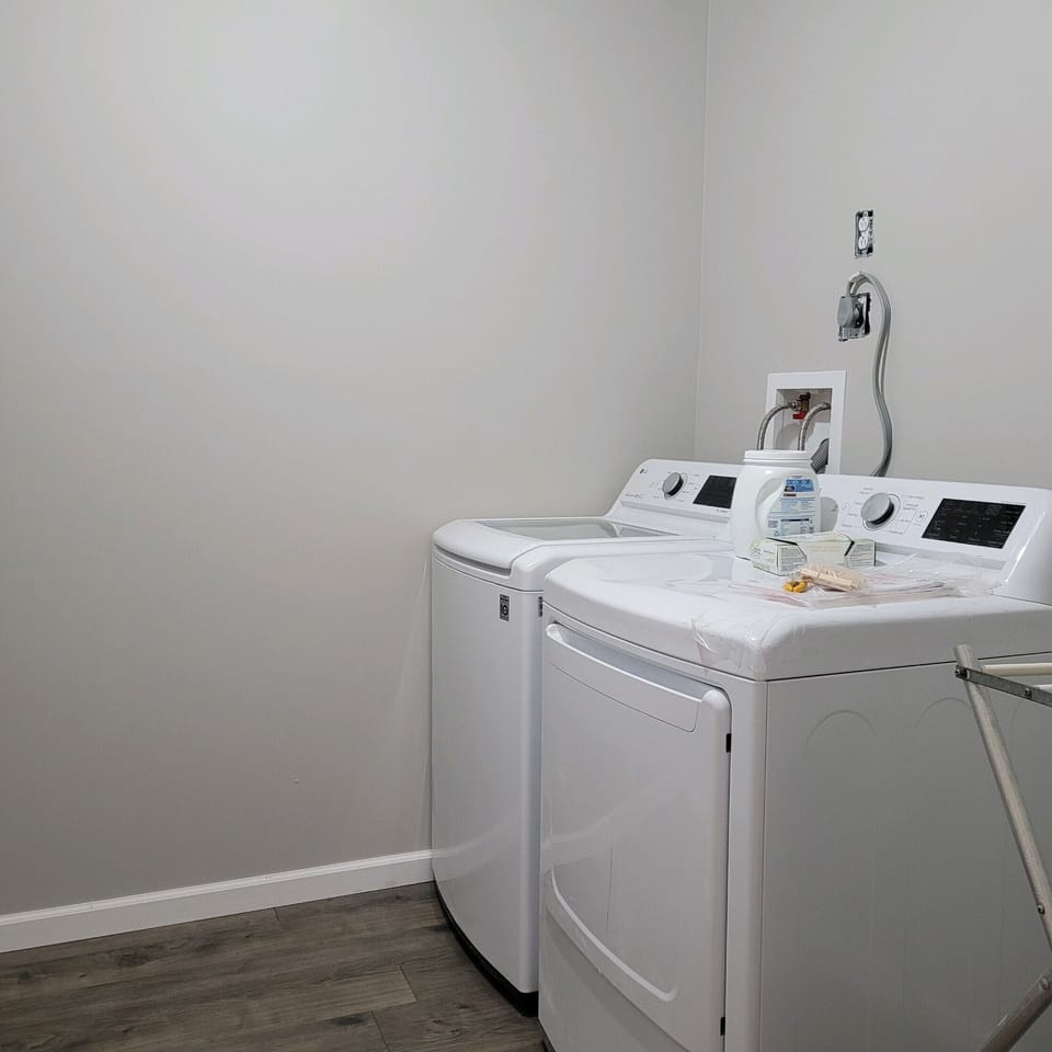 Laundry room with washer and dryer