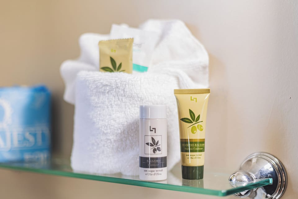 Standard Room, 2 Queen Beds | Bathroom | Towels