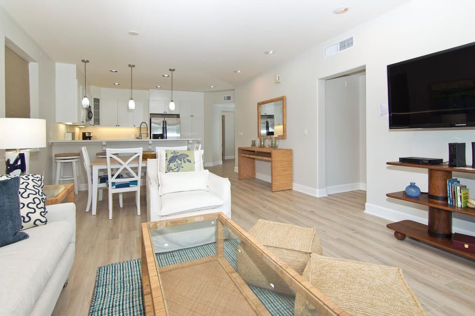 Open concept layout connects kitchen, dining, and living room