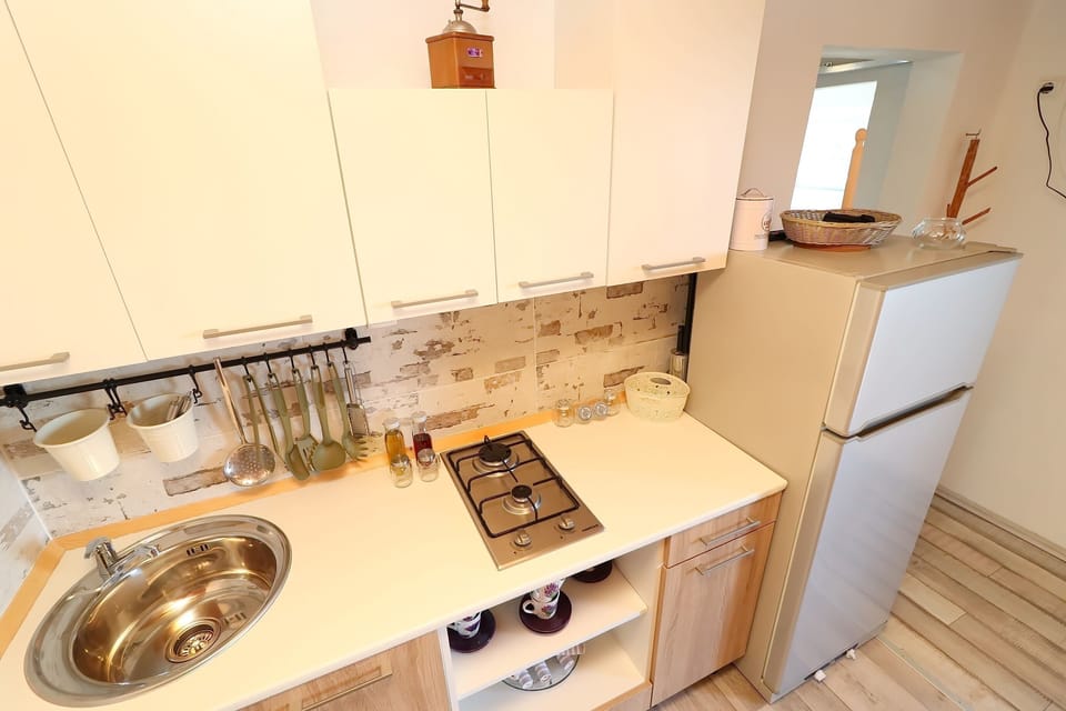 Cottage (Two Bedroom Holiday Home - Terrace an) | Private kitchen | Fridge, stovetop, cookware/dishes/utensils