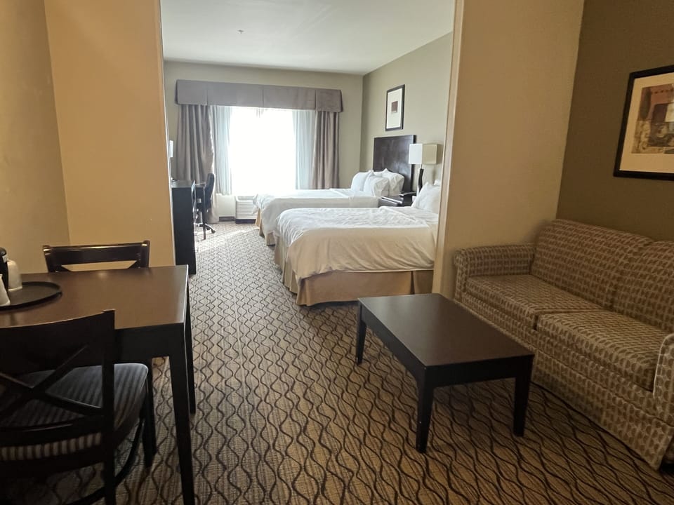 Suite | Desk, blackout drapes, iron/ironing board, cribs (free)