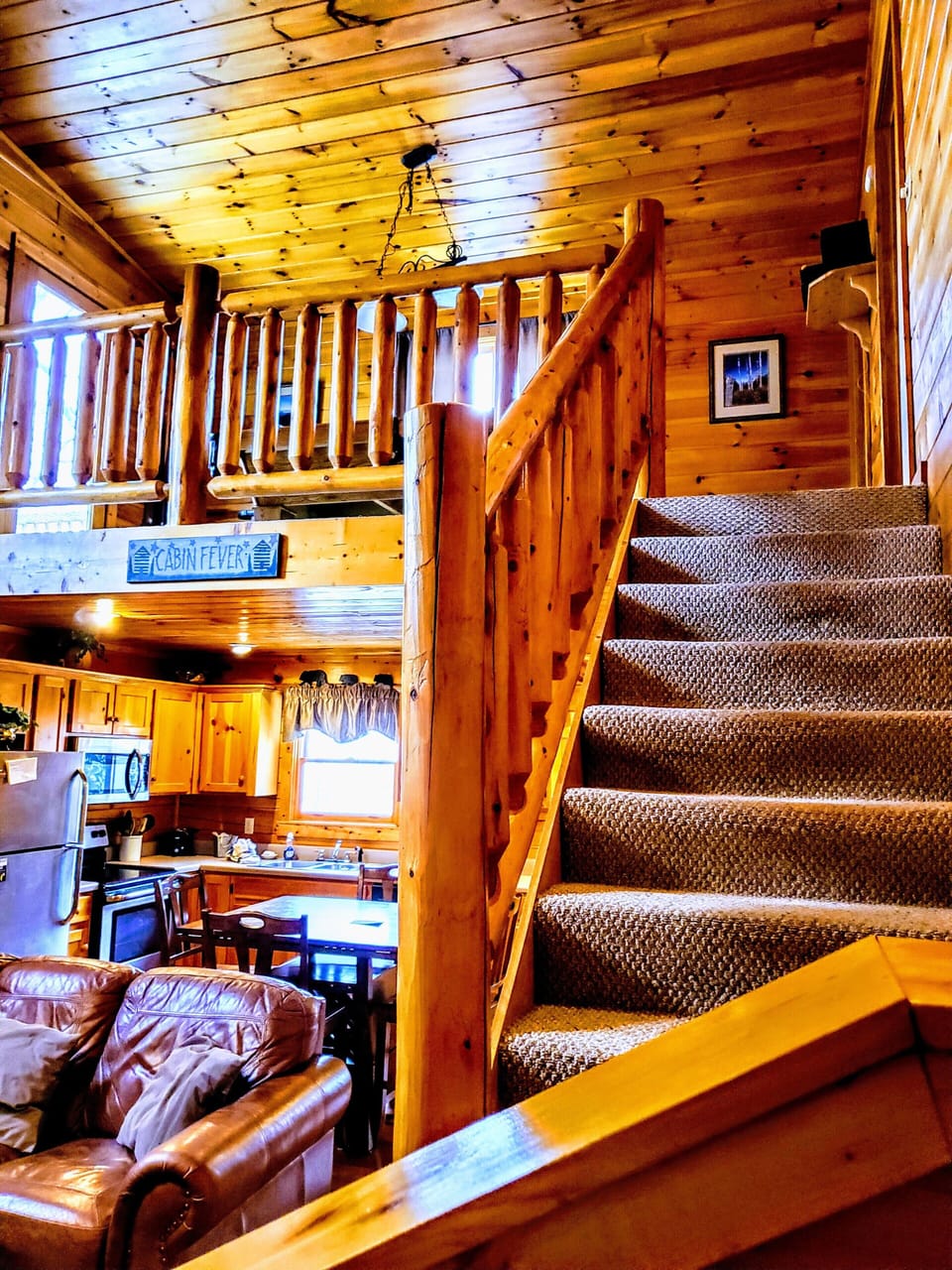 Stairs leading to gameroom and second floor bedroom & bathroom 