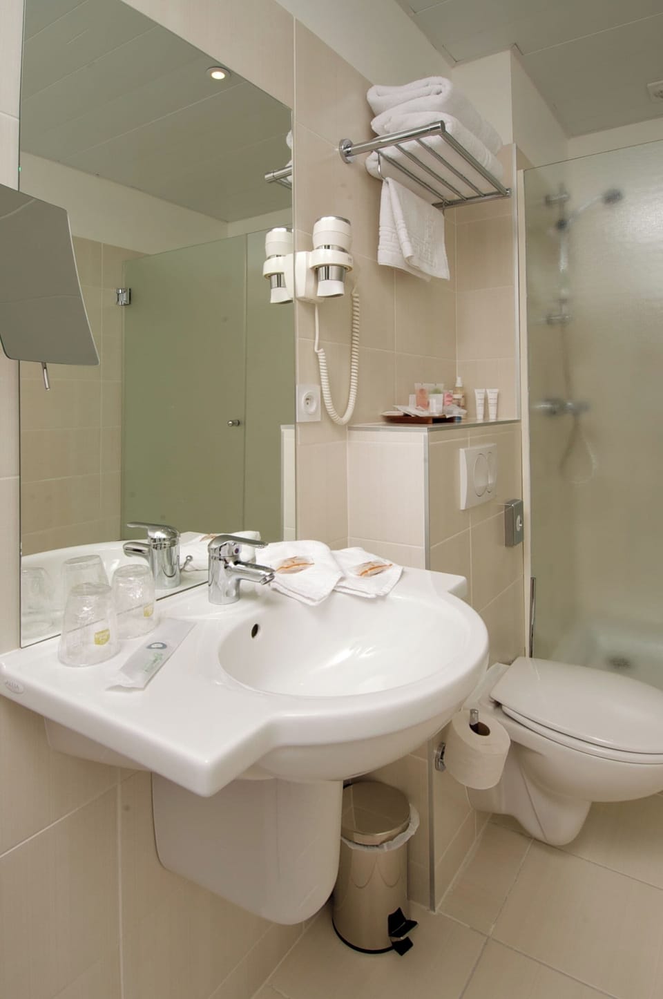 Eco-friendly toiletries, hair dryer, bathrobes, slippers