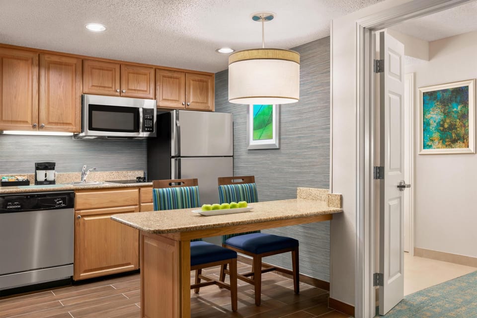 Suite, 2 Queen Beds, Non Smoking | Private kitchen | Full-size fridge, microwave, stovetop, dishwasher