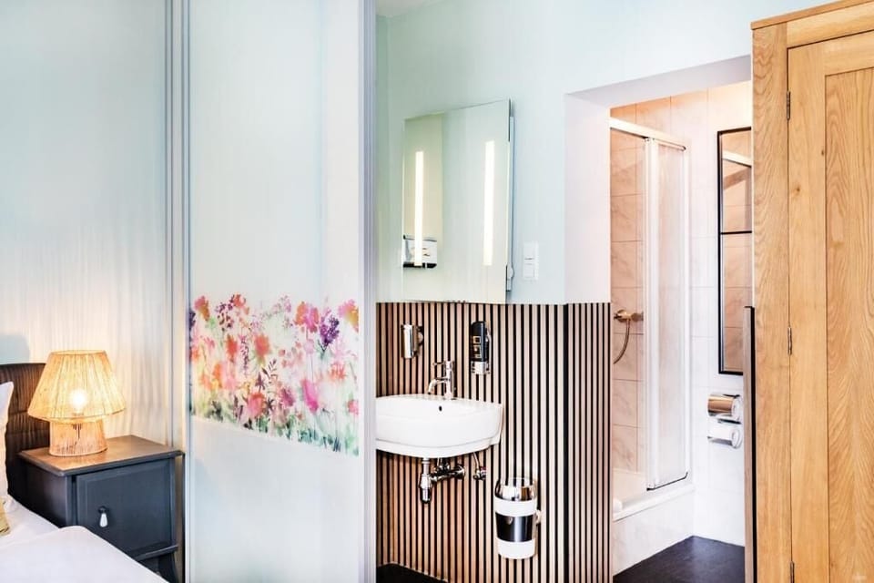 Quadruple Room | Bathroom | Shower, free toiletries, hair dryer, towels