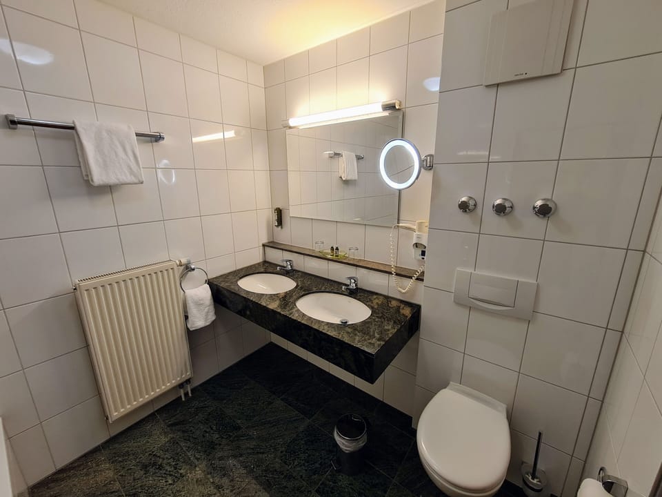 Comfort Double or Twin Room, Garden View | Bathroom | Eco-friendly toiletries, hair dryer, slippers, towels