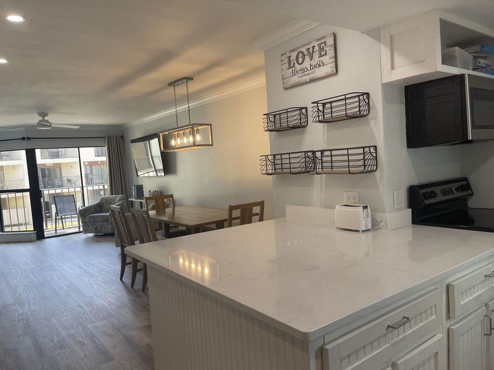 Huge Quartz Countertop. Great for Meals in after a Perfect Day in the Gulf Sun. 