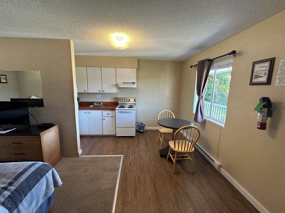 Standard Room, 2 Double Beds, Kitchenette | Living area | 32-inch LED TV with cable channels, TV