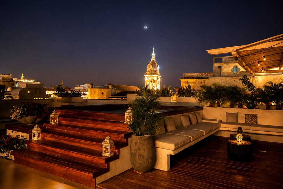 Rooftop views toward Cartagena’s cathedral and historic skyline.