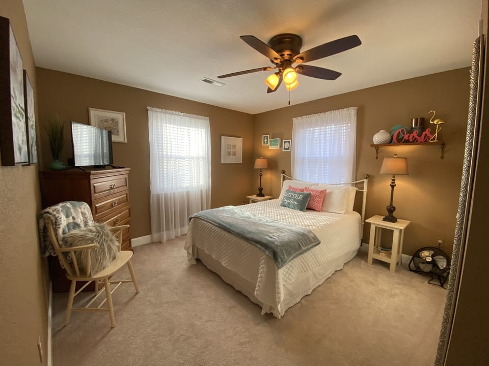 Third floor queen size bedroom and tv