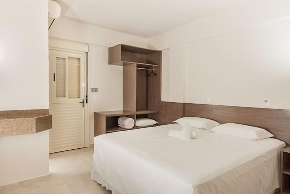 Deluxe Double Room | Minibar, desk, blackout drapes, free WiFi