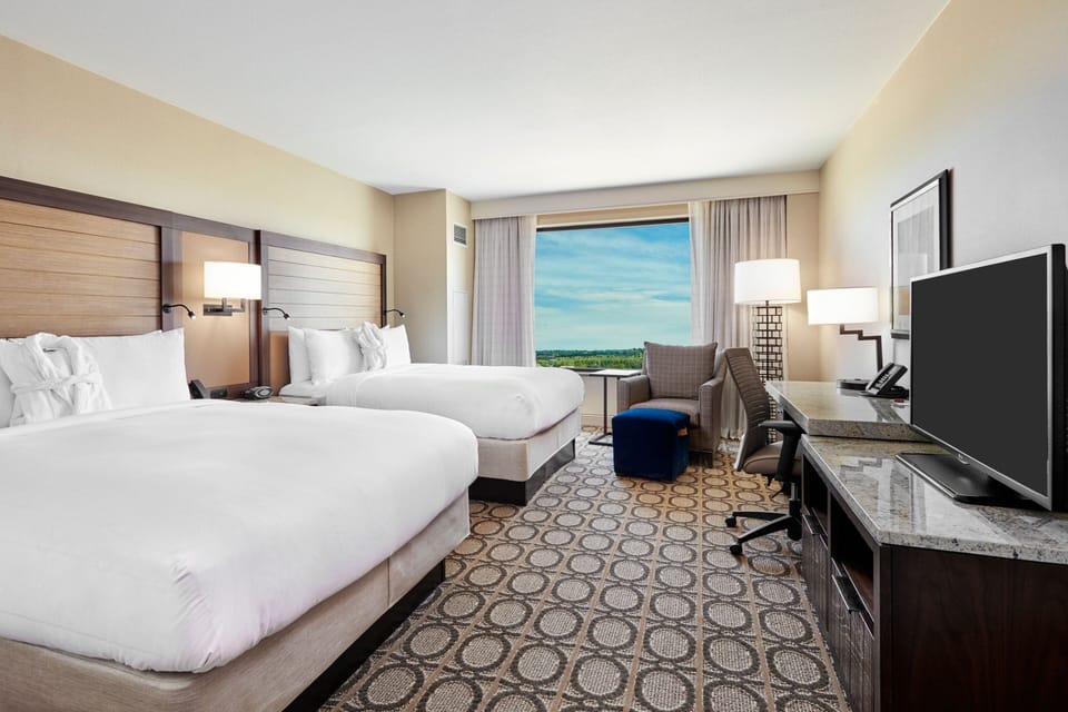 Premium bedding, down comforters, pillowtop beds, in-room safe