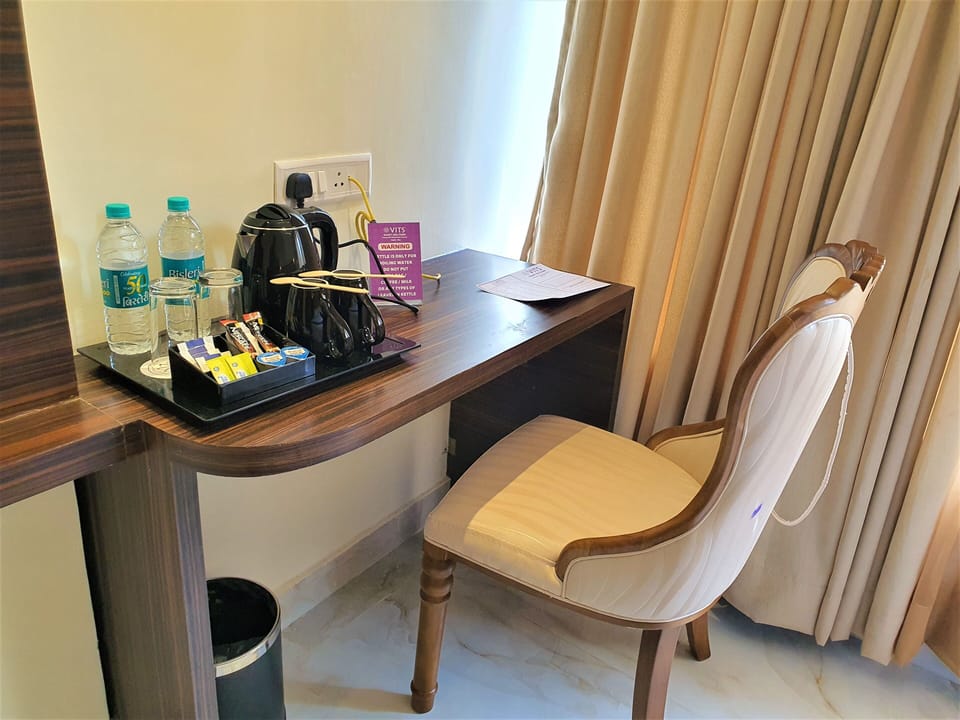 Deluxe City View Room | Premium bedding, desk, blackout drapes, iron/ironing board