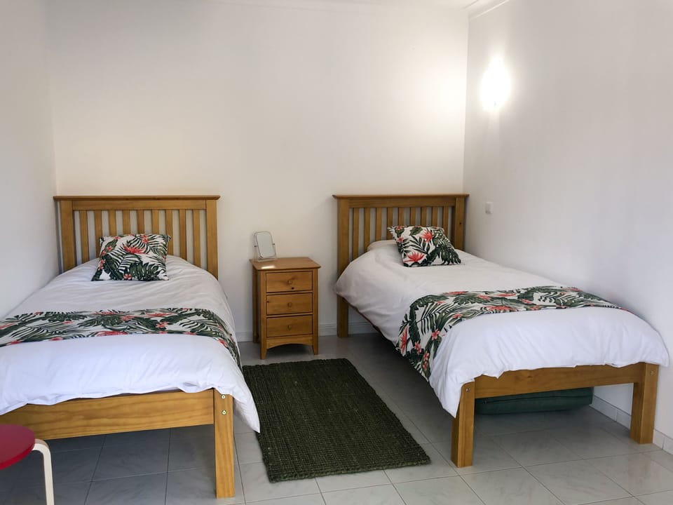 Twin bedroom with wardrobe