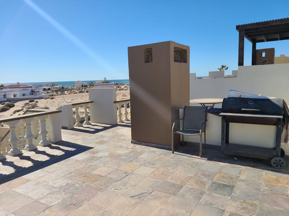 Large Margarita Deck, Charcoal BBQ, and dining area. Relax with a cold beverage
