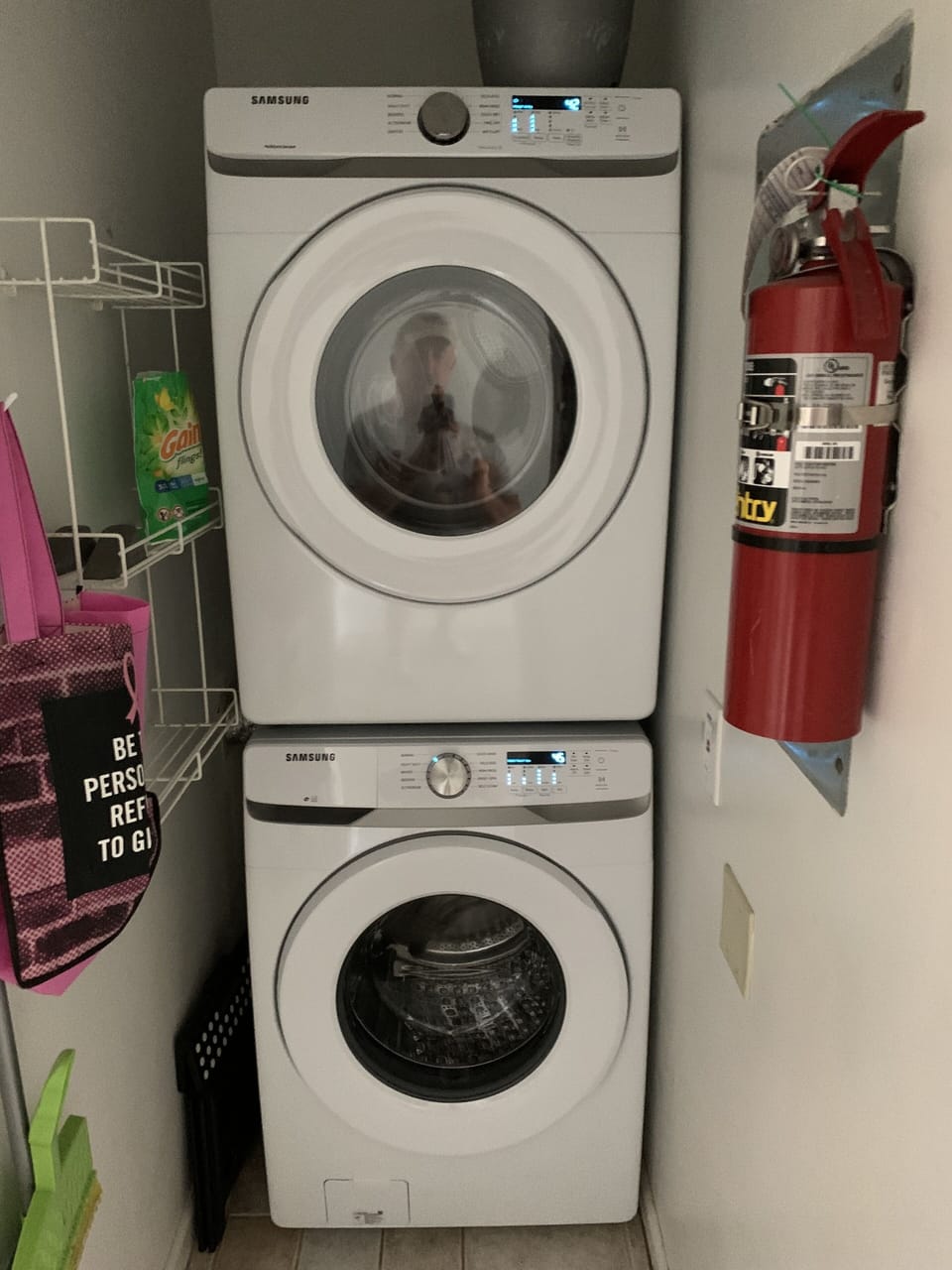Full size stacked washer and dryer in condo