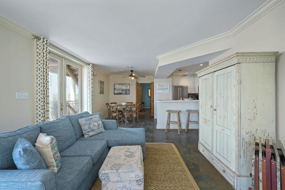 OPEN LIVING W/ LARGE SECTIONAL, FOLDS OUT TO SLEEPER
