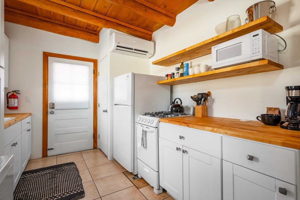Fresh kitchen with butcher block countertops
