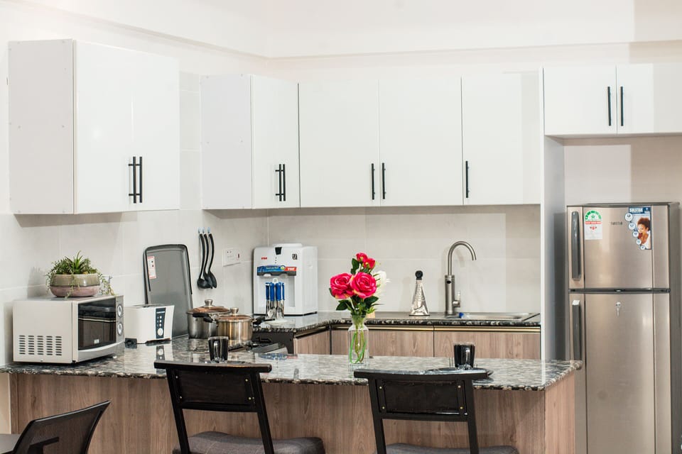 Apartment, 1 Bedroom | Private kitchen | Full-size fridge, microwave, oven, stovetop
