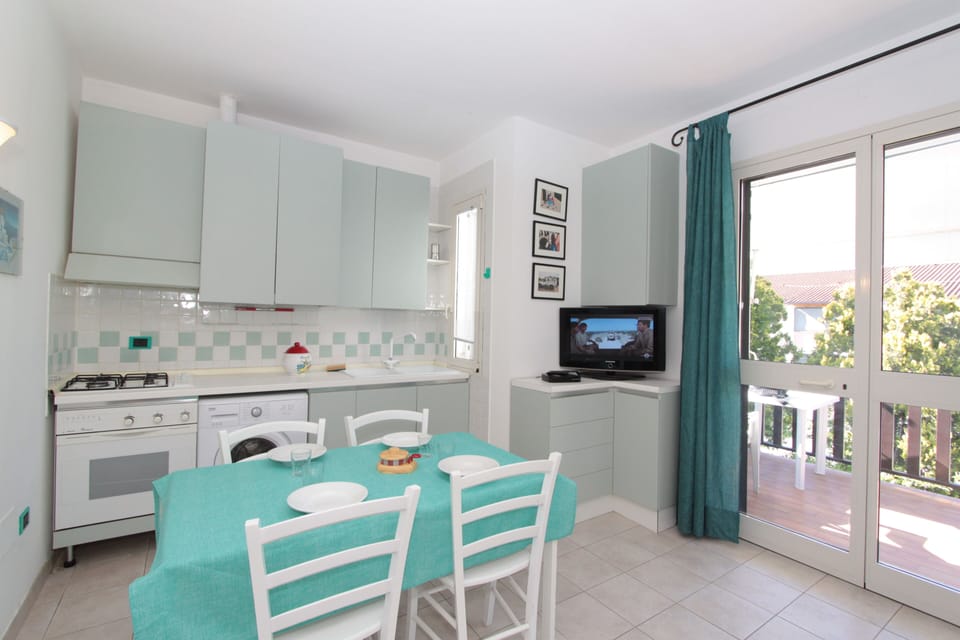 Classic Apartment | Living area | 20-inch flat-screen TV with satellite channels, TV